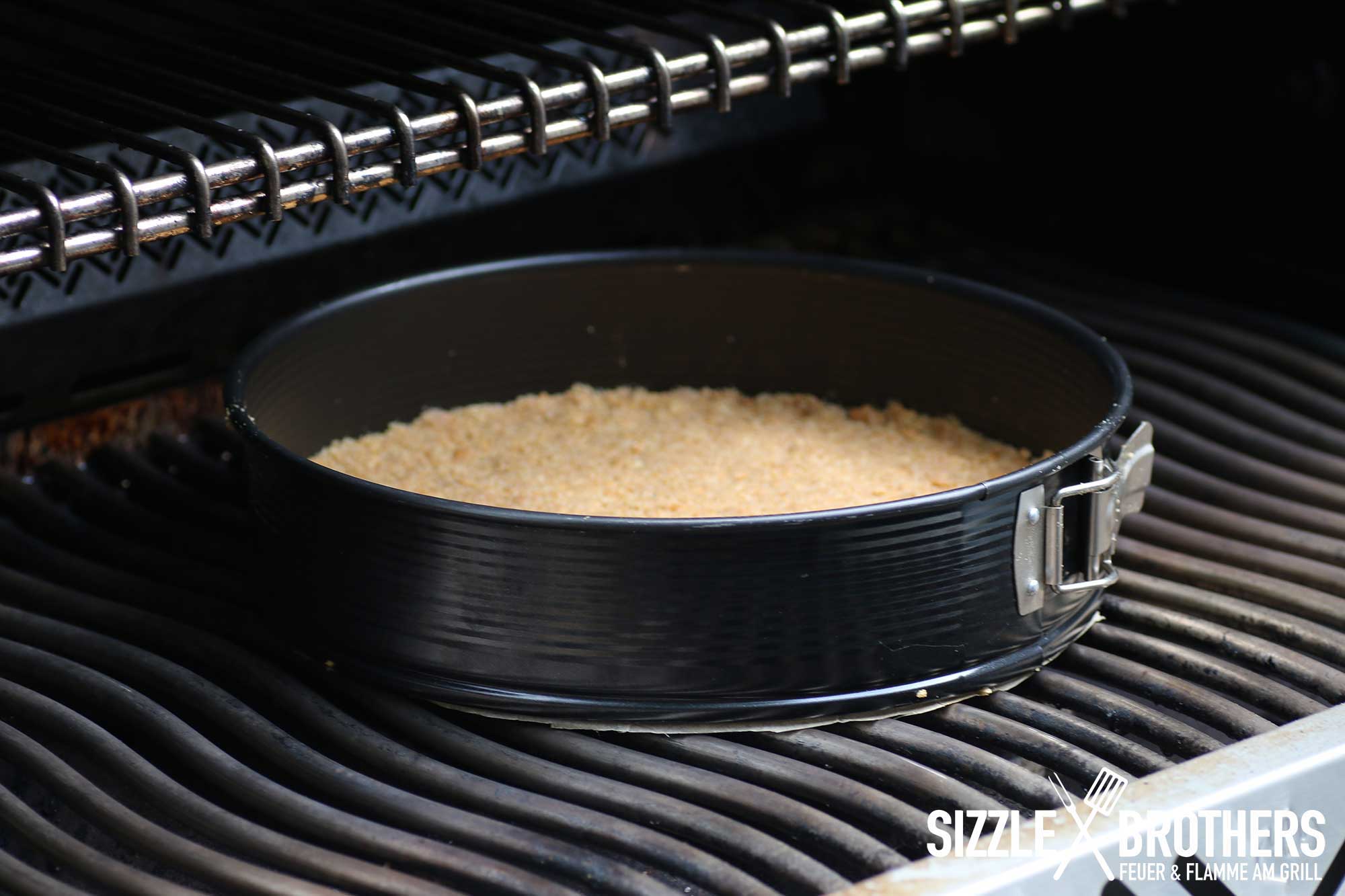 Der Käsekuchen auf dem Grill