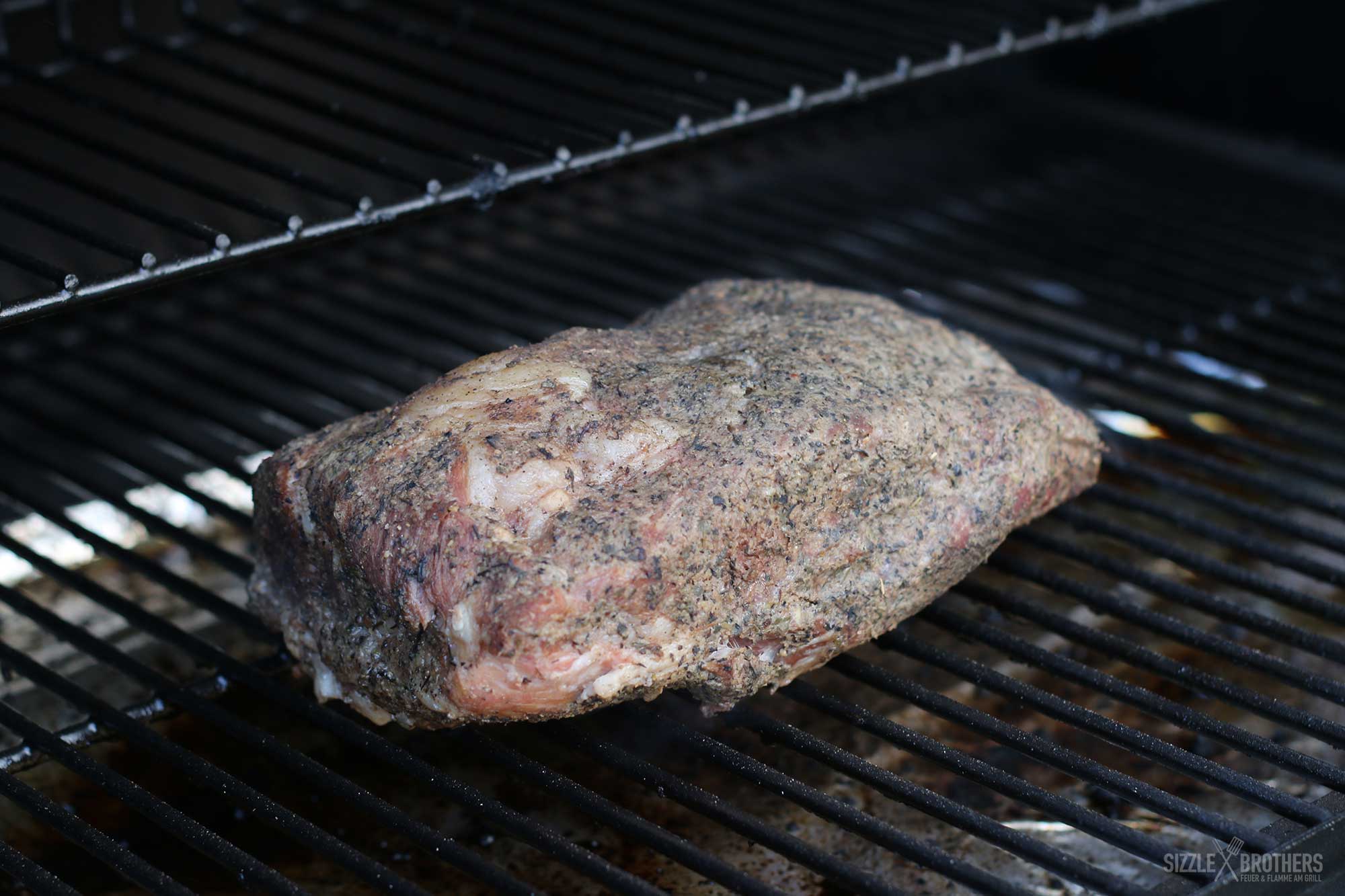 Schweinenacken gewürzt auf dem Smoker
